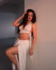 Sensual Actress Avneet Kaur in a White Halter Crop Top Photos 01