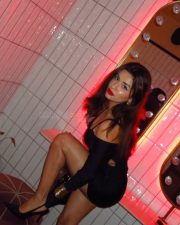 Sexy Avneet Kaur in a Black Cut Out Long Sleeve Mini Dress Photos 05