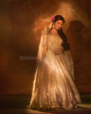 Sexy Model Avneet Kaur in a Royal Ivory White and Gold Anarkali Dress Photos 02