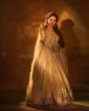 Sexy Model Avneet Kaur in a Royal Ivory White and Gold Anarkali Dress Photos 03