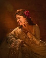 Sexy Model Avneet Kaur in a Royal Ivory White and Gold Anarkali Dress Photos 04