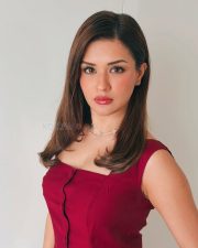 Stunning Avneet Kaur in a Bold Crimson Sleeveless Top with Matching Trousers Photos 02
