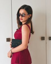Stunning Avneet Kaur in a Bold Crimson Sleeveless Top with Matching Trousers Photos 04