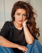 Tiku Weds Sheru Actress Avneet Kaur in a Black Crew Neck T Shirt with a Pair of Blue Denim Jeans Photos 01