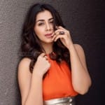Nikki Galrani 11 svg%3E