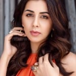 Nikki Galrani 14 svg%3E