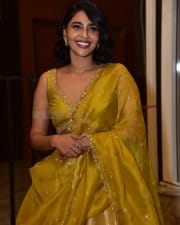 Actress Aishwarya Lekshmi at King of Kotha Pre Release Event Photos 12