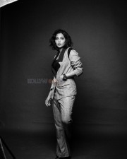 Actress Aishwarya Lekshmi in a Crop Top with Blazer Pant Black and White Photos 01