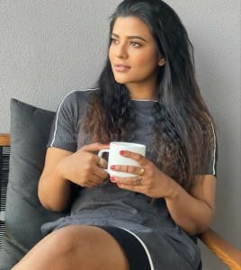 Actress Aishwarya Rajesh with a Coffee Cup Photoshoot Pictures 02