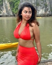 Actress Anicka Vikhraman Holiday Red Bikini Photos 01