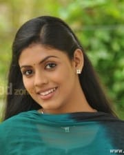 Actress Iniya In Ammavin Kaippesi Movie Stills