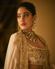 Actress Janhvi Kapoor in a Custom Ivory and Gold Lehenga with a Matching Nude Blouse Photos 01