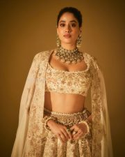 Actress Janhvi Kapoor in a Custom Ivory and Gold Lehenga with a Matching Nude Blouse Photos 04