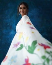 Actress Keerthy Suresh in a White Floral Saree Photos 03