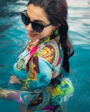 Actress Parvati Nair in Swimming Pool Photoshoot Stills 01