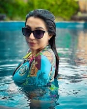 Actress Parvati Nair in Swimming Pool Photoshoot Stills 03