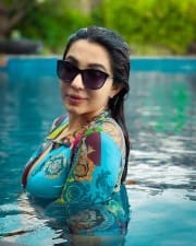 Actress Parvati Nair in Swimming Pool Photoshoot Stills 04