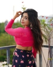 Actress Parvati Nair in a Pink Crop Top Photoshoot Pictures 04