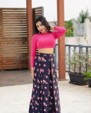 Actress Parvati Nair in a Pink Crop Top Photoshoot Pictures 05