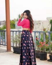 Actress Parvati Nair in a Pink Crop Top Photoshoot Pictures 06