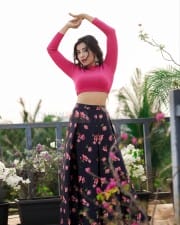 Actress Parvati Nair in a Pink Crop Top Photoshoot Pictures 07