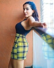 Actress Parvati Nair in a Sexy Mini Skirt Photoshoot Pictures 01