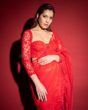 Actress Raashii Khanna in a Sheer Red Saree Photos 04