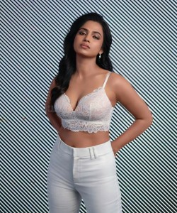 Actress Ramya Pandian in a White Elegant Sexy Bralette Photos 01
