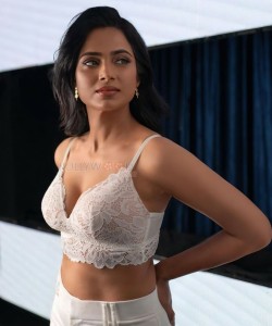Actress Ramya Pandian in a White Elegant Sexy Bralette Photos 02