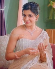 Actress Samantha Ruth Prabhu in a Corset Blouse and Transparent White Saree with a Diamond Necklace Photos 02