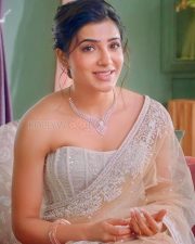 Actress Samantha Ruth Prabhu in a Corset Blouse and Transparent White Saree with a Diamond Necklace Photos 03