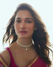 Actress Tamannah Bhatia in a Pink Floral Printed Saree with a Sleeveless Blouse at Odela 2 Movie Press Meet Stills 02