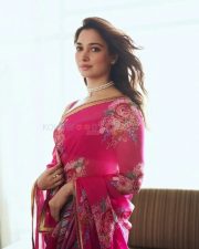 Actress Tamannah Bhatia in a Pink Floral Printed Saree with a Sleeveless Blouse at Odela 2 Movie Press Meet Stills 04