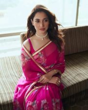 Actress Tamannah Bhatia in a Pink Floral Printed Saree with a Sleeveless Blouse at Odela 2 Movie Press Meet Stills 05