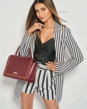 Actress Tara Sutaria in a Black and White Striped Dress Photo 01