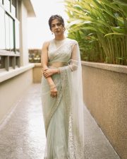 Adhirshtasaali Actress Madonna Sebastian in a White Sheer Bridal Saree Photos 01