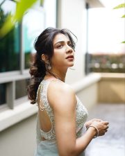 Adhirshtasaali Actress Madonna Sebastian in a White Sheer Bridal Saree Photos 02