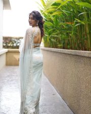 Adhirshtasaali Actress Madonna Sebastian in a White Sheer Bridal Saree Photos 03