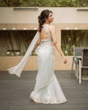 Adhirshtasaali Actress Madonna Sebastian in a White Sheer Bridal Saree Photos 04