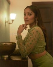 Adorable Anikha Surendran in a Green Thigh Slit Gown Pictures 01