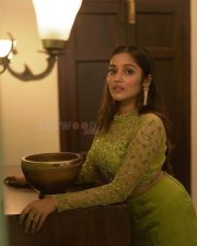 Adorable Anikha Surendran in a Green Thigh Slit Gown Pictures 02