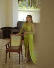 Adorable Anikha Surendran in a Green Thigh Slit Gown Pictures 03