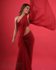 Alluring Actress Yashika Aannand in a Red Sheer Saree with Sequin Blouse Photos 01
