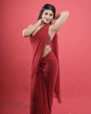 Alluring Actress Yashika Aannand in a Red Sheer Saree with Sequin Blouse Photos 02