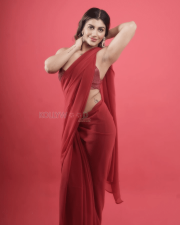 Alluring Actress Yashika Aannand in a Red Sheer Saree with Sequin Blouse Photos 02 1