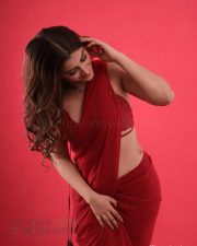Alluring Actress Yashika Aannand in a Red Sheer Saree with Sequin Blouse Photos 03