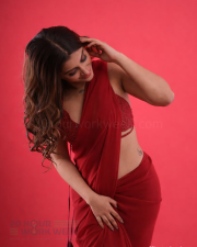 Alluring Actress Yashika Aannand in a Red Sheer Saree with Sequin Blouse Photos 03