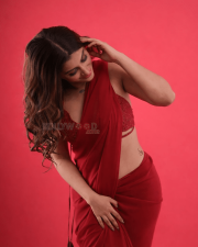 Alluring Actress Yashika Aannand in a Red Sheer Saree with Sequin Blouse Photos 03 1