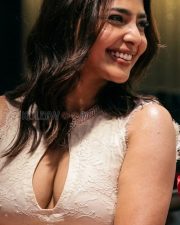 Alluring Aishwarya Lekshmi Cleavage in a White Lace Keyhole Dress Photos 01
