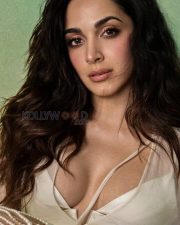 Alluring Kiara Advani Cleavage in an Ivory Sheer Pearl Ensemble Photos 01